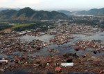Indian Ocean (Jan. 2, 2005) A village near the coast of Sumatra lays in ruin after the Tsunami that struck South East Asia.  U.S. Navy photo by Photographer's Mate 2nd Class Philip A. McDaniel 